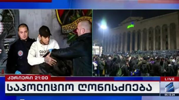 ЗМІ пишуть про затримання українця на антиурядових протестах у Грузії Фото: скрин відео / © 