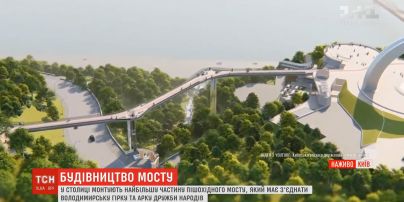У столиці завершують зводити основні конструкції нового пішохідного мосту