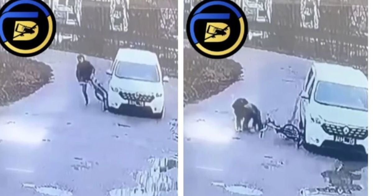 Скриншот по видео инцидента, где машина ТЦК совершает наезд на велосипедиста