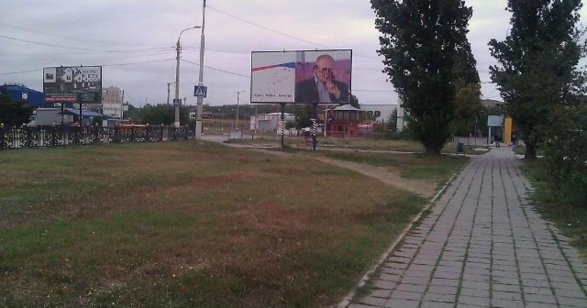 портрети путіна в криму_7