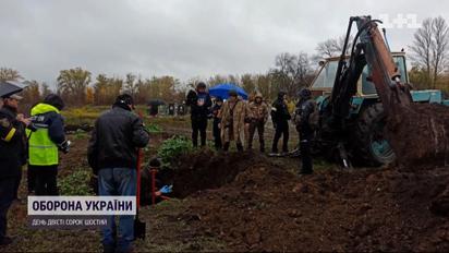 На Харківщині знайшли братську могилу українських воїнів