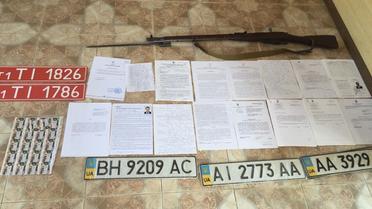 В доме председателя Апелляционного суда нашли оружие, госномера и документы с грифом &laquo;секретно&raquo; / © Пресс-служба ГПУ