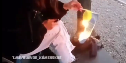 В Каменском девушка сожгла флаг Украины: в полиции открывают уголовное производство