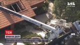 Новости мира: в США строительный кран пробил крышу жилого дома