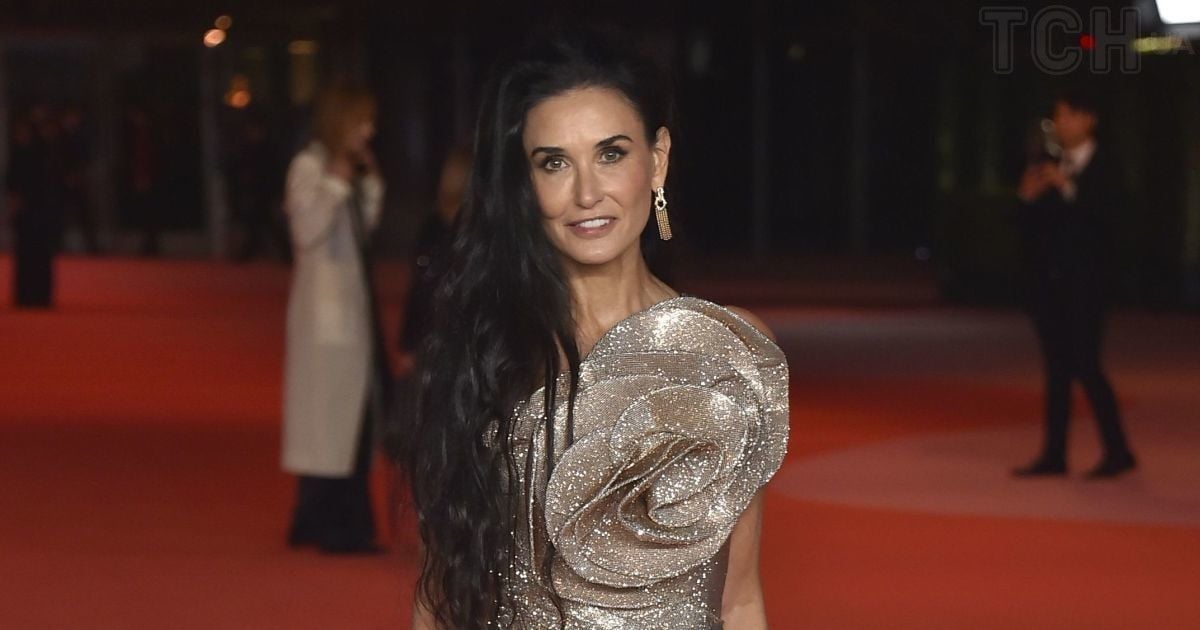 Demi Moore Stuns in Luxurious Gold Dress at 2023 Academy Museum Gala