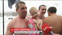 Празднование Крещения: в ледяную воду ныряют целыми семьями