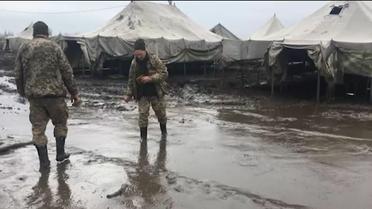 Украинская армия на учениях на полигоне Широкий Лан тонет в грязи