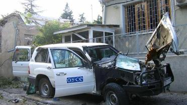 Неизвестные в Донецке подожгли машины миссии ОБСЕ / © Twitter/Оккупанти - домой