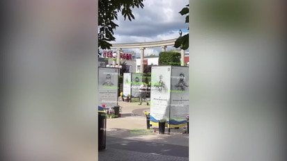 В Ирпене женщина избивала портреты погибших бойцов