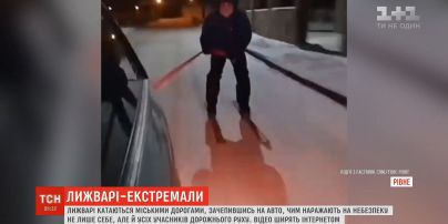 В Ровно экстремалы катаются на лыжах, зацепившись за авто
