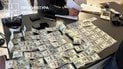 Знайдені під час обшуків у поліції гроші