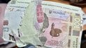 Propaganda leaflets disguised as 100-hryvnia banknotes