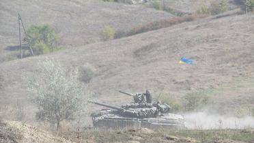 Украинские военные начали отводить танки от линии фронта. / © Facebook/пресс-центр штаба АТО