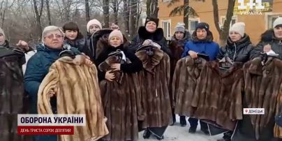 Ношена шуба замість чоловіка: російські окупанти видали "допомогу" жінкам вбитих мобілізованих
