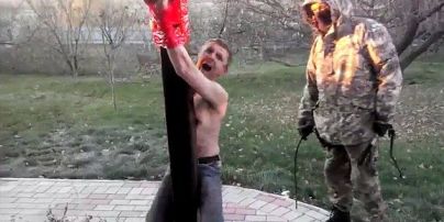Ужасное видео пыток боевиками наркоторговца на Донбассе шокировало западные СМИ