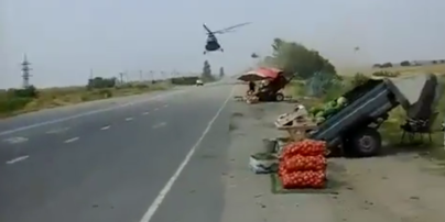 В Запорожье сняли видео феерического приземления военного вертолета посреди дороги