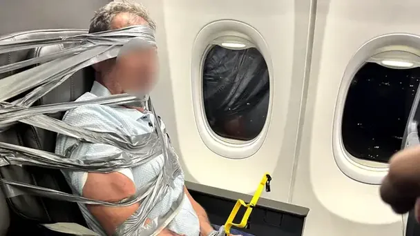 Пасажира скотчем зафіксували в кріслі - літак American Airlines екстрено сів Фото: unilad.