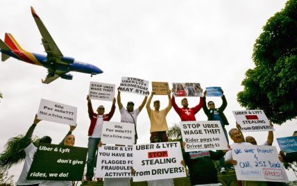 В США, Британии и Австралии водители Uber вышли на акции протеста из-за мизерных зарплат
