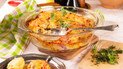 Картопля запечена з сосисками, помідорами та сиром
