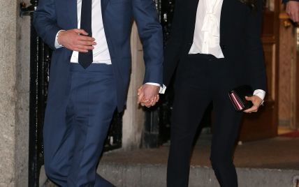 В костюме от Alexander McQueen и на шпильках: Меган Маркл с принцем Гарри впервые вышла на красную дорожку
