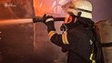 Рятувальник на місці пожежі