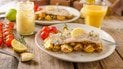 Хек запечений із картоплею в маринаді