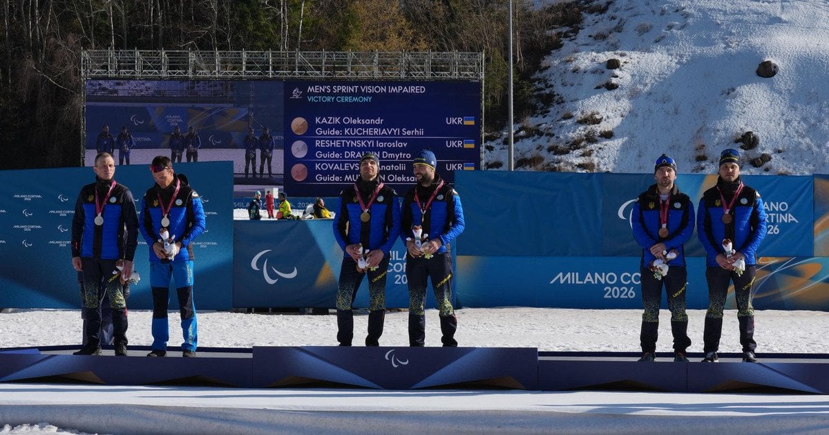 Олександр Казік разом з гайдом Сергієм Кучерявим (по центру) / Національний паралімпійський комітет України