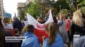 Біженці-українці вийшли на кількатисячний мітинг у Варшаві 