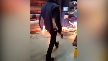 Как начинался пожар в "Эпицентре": появилось видео с поджигателем, который носился с топором