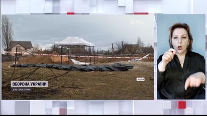 У Бучі розпочалась ексгумація тіл жертв російських загарбників (жеcтовою мовою)
