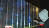 "Автомайдан" розфарбував в синьо-жовті кольори паркан біля Будинку профспілок