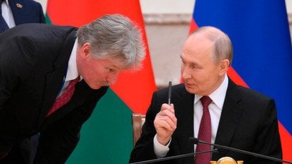 Пєсков і Путін.