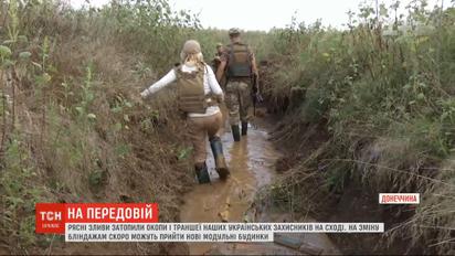 Негода на передовій: потужна злива затопила окопи і траншеї