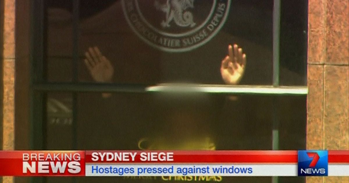 Заложников удерживают неизвестные в кафе в центре Сиднея / © Reuters