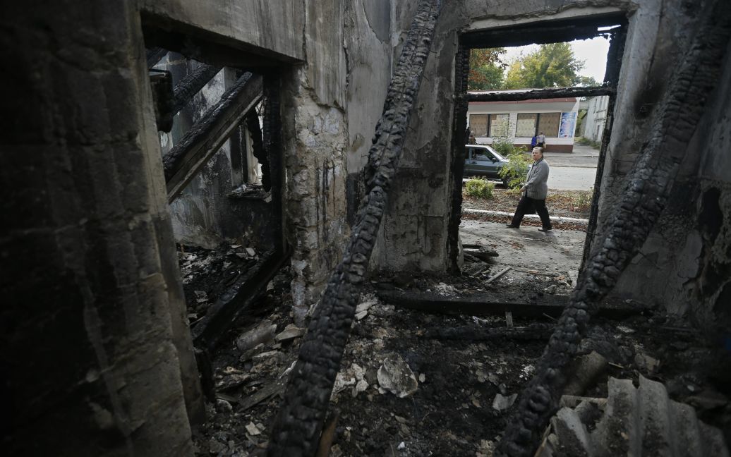 Боевики равняют Попасну. с землей. / © Reuters