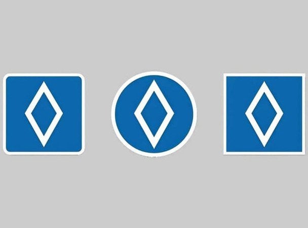 Знак для водіїв білий ромб на синьому тлі