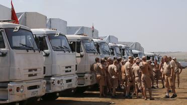 Военные в аналогичной форме возили боевикам &quot;гумконвои&quot; в 2014 году / © Reuters
