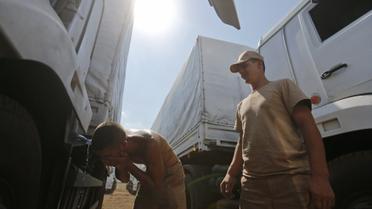 Военные в аналогичной форме возили боевикам &quot;гумконвои&quot; в 2014 году / © Reuters