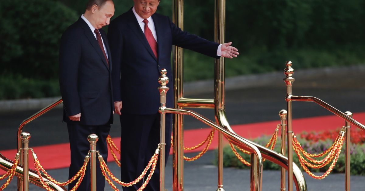 Президент РФ Владимир Путин и лидер Китая Си Цзиньпин/Associated Press