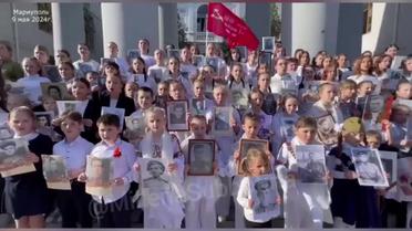 Марш "побєдобєсія" в Маріуполі: як росіяни повернули місто в СРСР