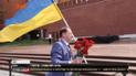 В Москве активист с украинским флагом устроил акцию у стен Кремля