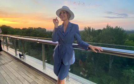 В шортах, шляпе и на шпильках: стильная Катя Осадчая на съемках "Светской жизни"