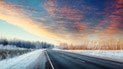 Зимова дорога на заході сонця