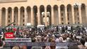 Новости мира: в Грузии прошли массовые протесты после смерти оператора