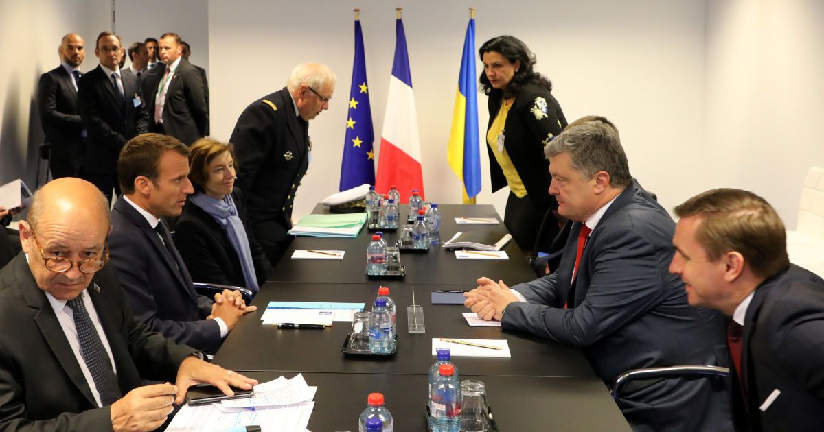 Путін відповідальний за жертви в Україні. Про що говорив Порошенко на симпозіумі НАТО