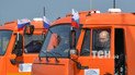 Путін їхав за кермом вантажівки