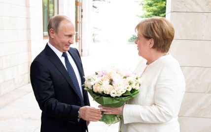 "Тримай ворогів ближче". Як Трамп допоміг скласти порядок денний переговорів Путіна і Меркель