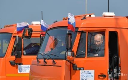 Десятки Камазов и Путин-дальнобойщик. Как открывали мост в оккупированный Крым