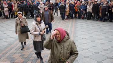 Віряни принесли до церкви гілочки верби / © Reuters