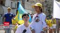 10-летняя японская волонтерша почтила жертв ракетного удара в Днепре